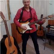 clases de guitarra,canto,grabaciones y musica en gral